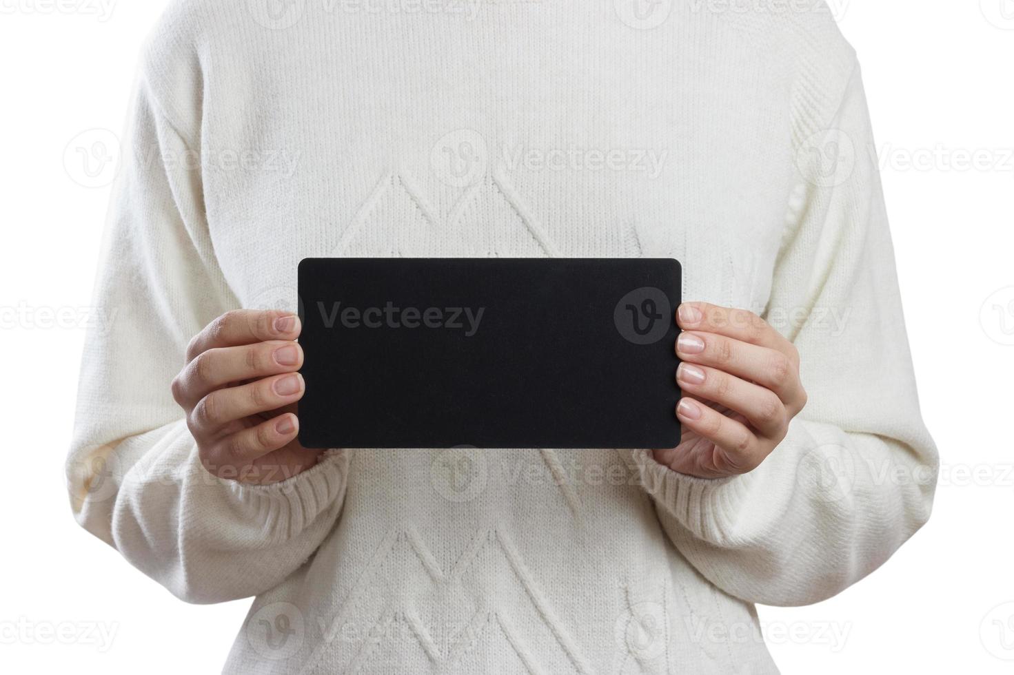 Girl holding an small blackboard isolated on white background photo