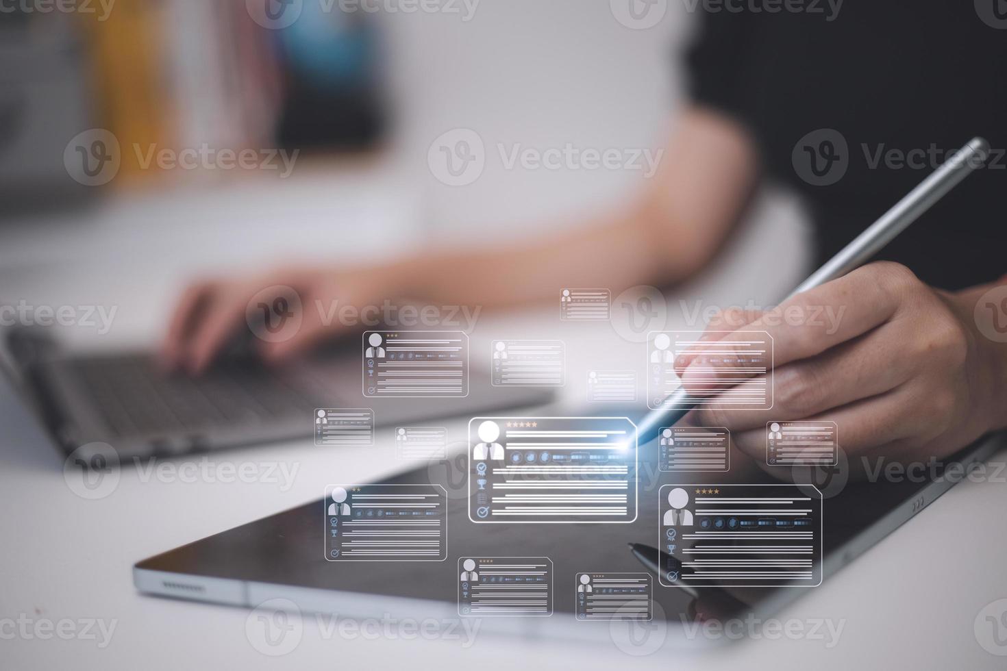 HR human resources technology.Online and modern technologies for simplifying the human resources system.Human resource manager checks the CV online to choose the perfect employee for his business. photo