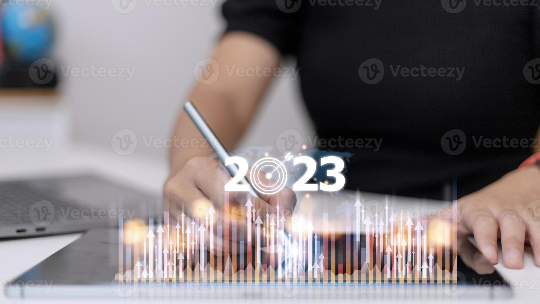 Business and Technology target set goals and achievement in 2023 new year resolution statistics graph rising revenue, planning to start up strategy, icon concept photo