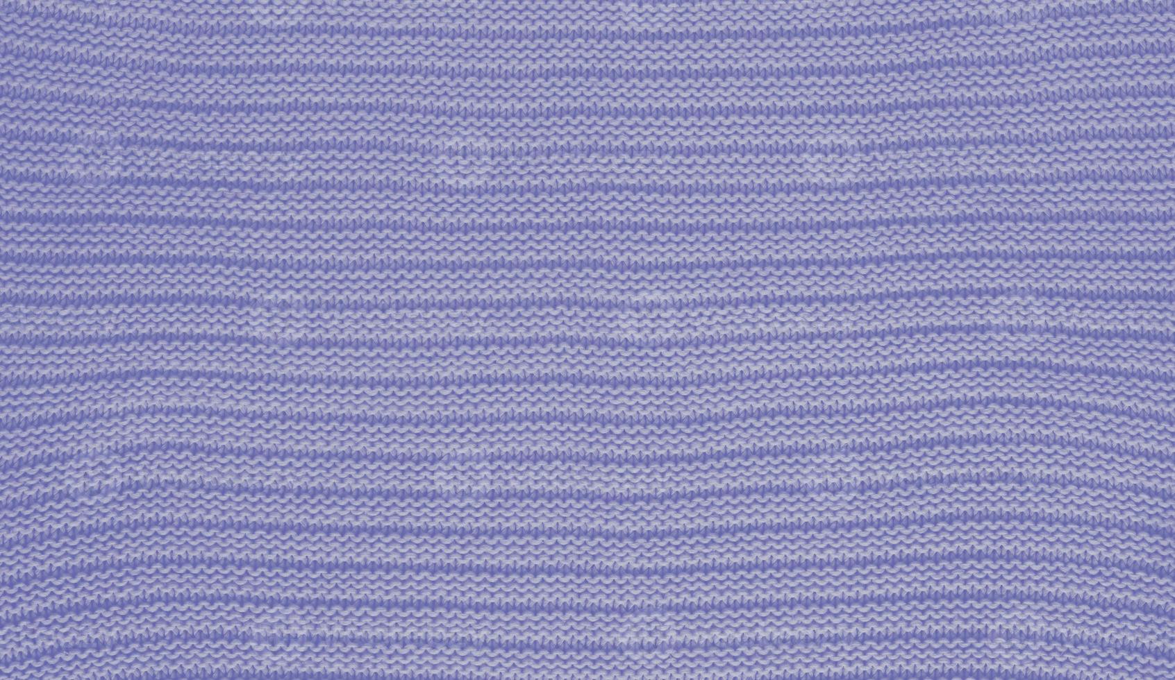Texture of smooth knitted sweater with pattern. Handmade knitting wool or cotton fabric texture. Background of knitting patterns with horizontal stripes. photo