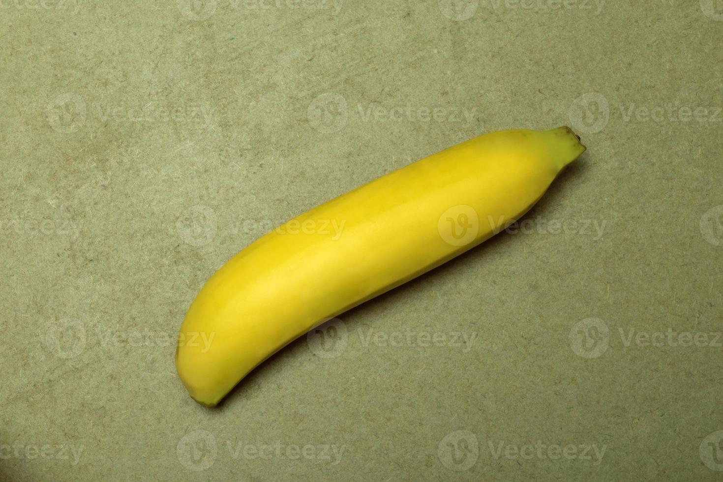 Healthy fruit banana on green table. photo
