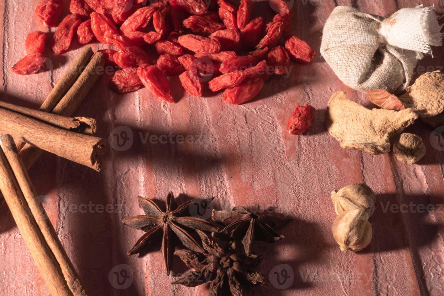 Healthy Chinese herb on red background. photo