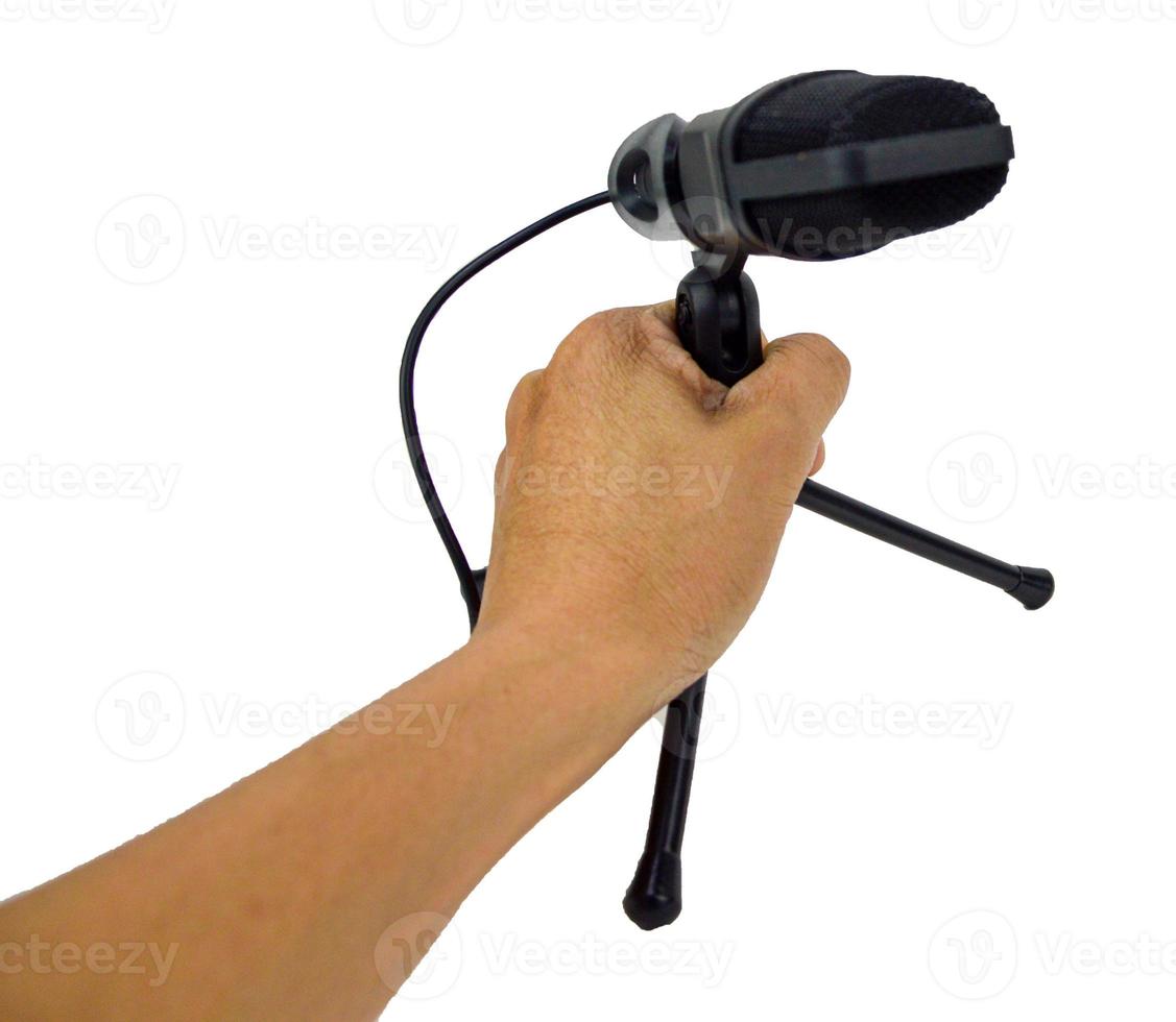 hand holding a black microphone photo