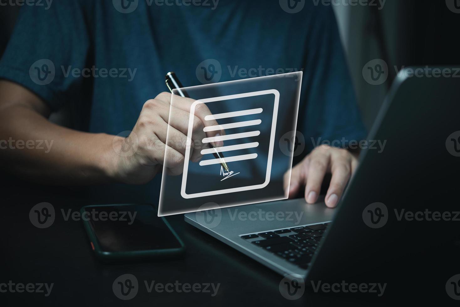 Electronic Signature Concept.e-signing Businessman signs electronic contract online documents. photo