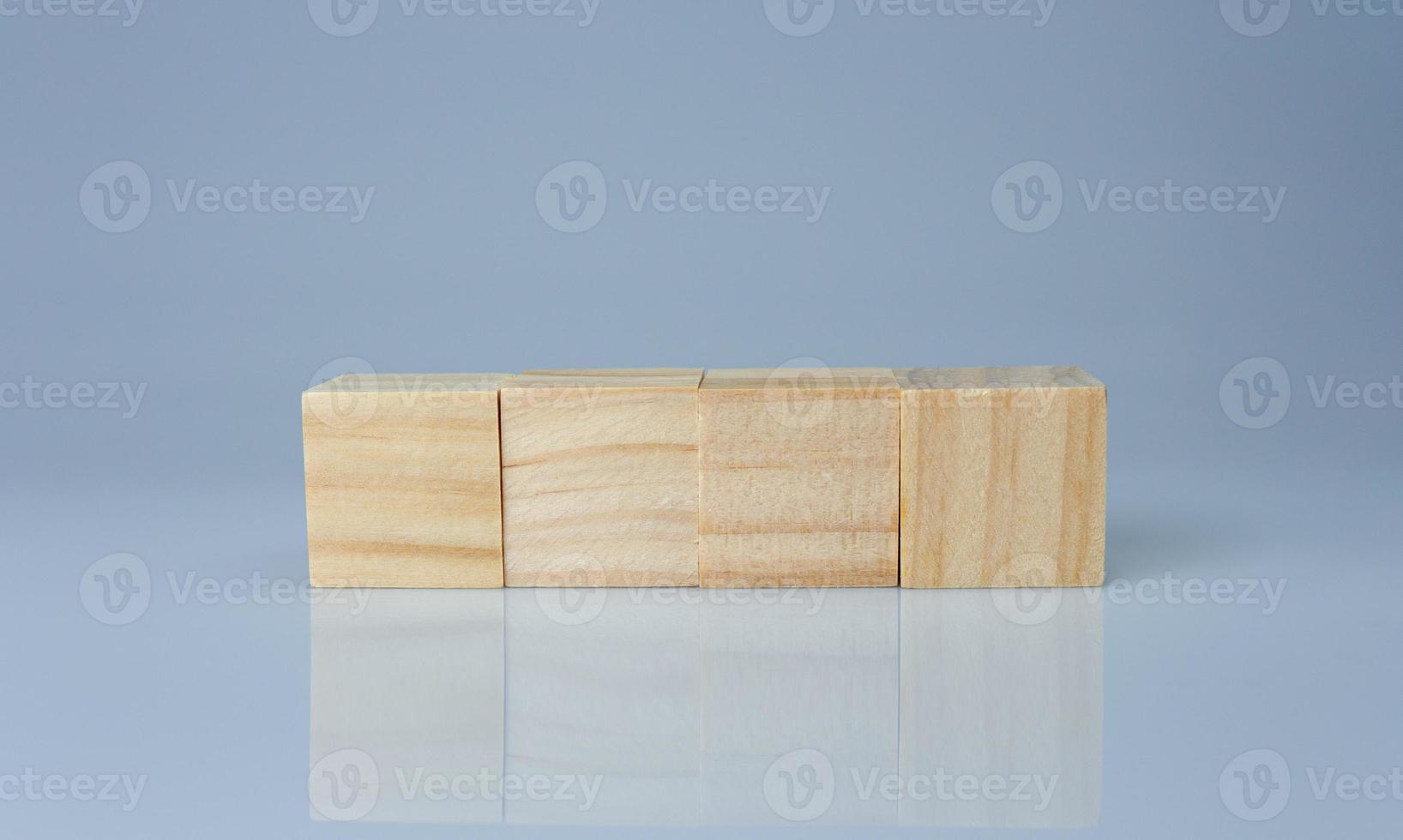 empty wooden blocks lined up on a white background. Business concept. photo