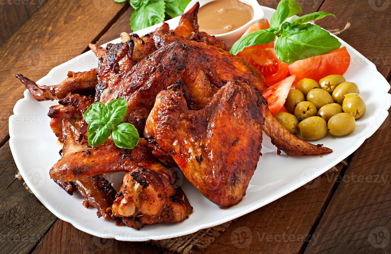 Plate of chicken wings on wooden background 14281250 Stock Photo at