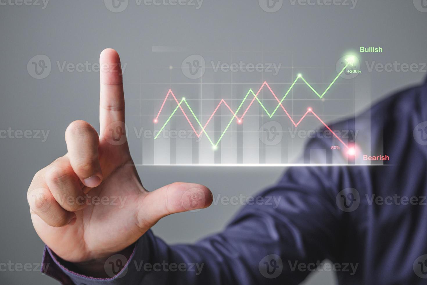 Investing concept. The man uses hand to open chart. That is comparison of stock markets in bullish and bearish. Hologram future technology. photo