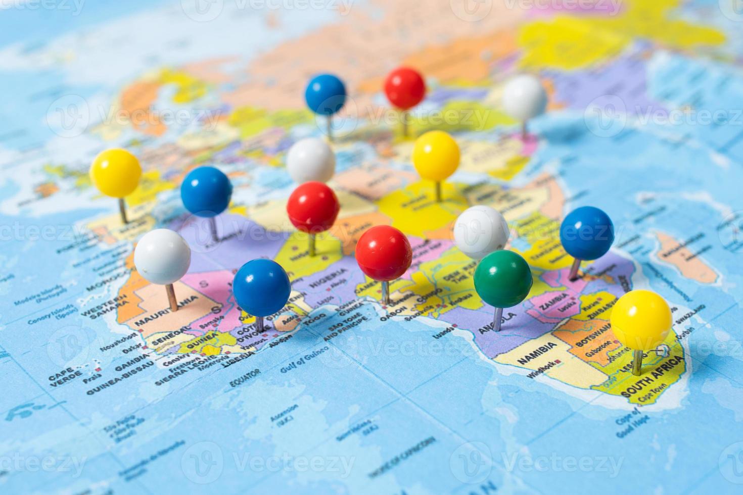 various locations with pins, push pin on map closeup photo