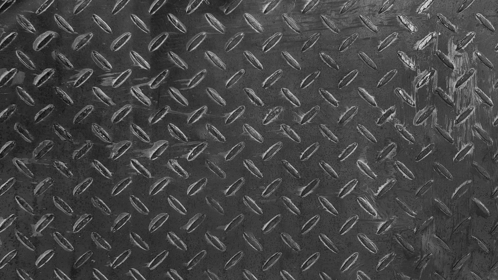 Rusty stainless steel background Seamless pattern of rust iron wall or wallpaper in black and white tone or monochrome. Textured or grunge panel and Hard material concept. photo