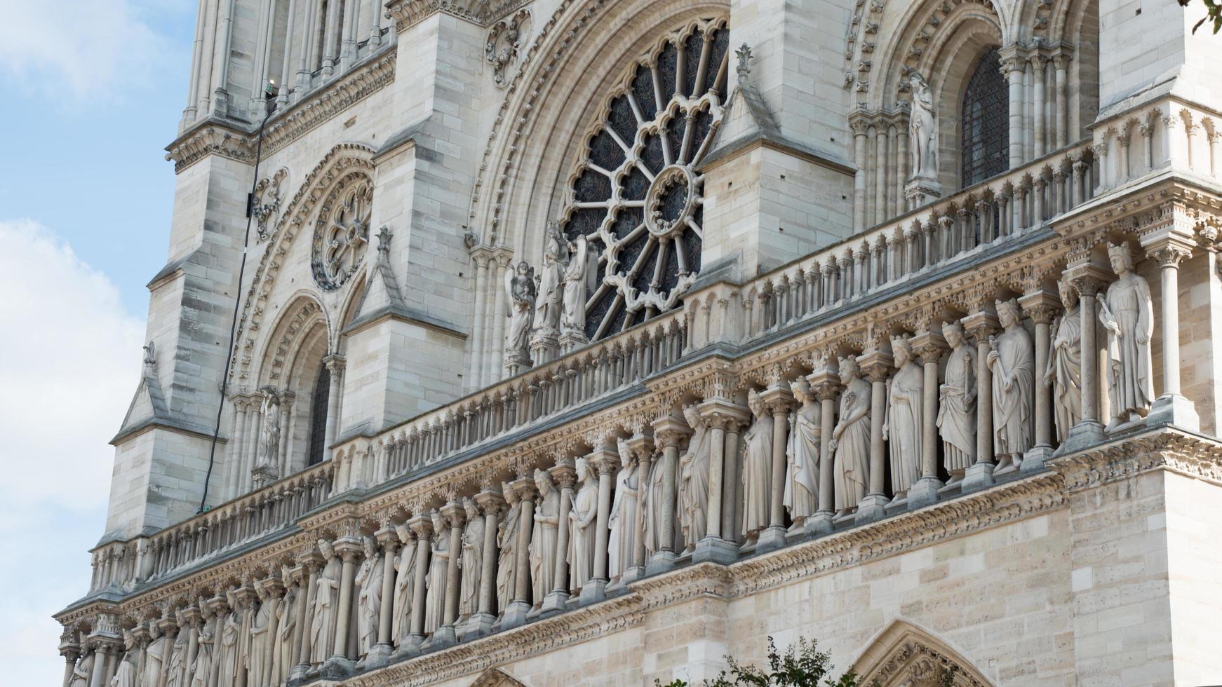 Close up of facade of Notre Dame, in Paris photo