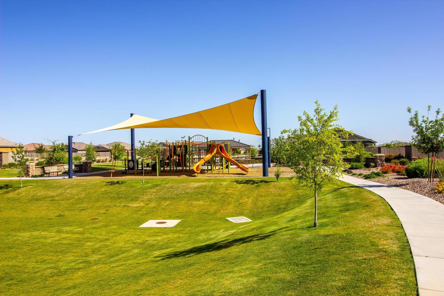 Housing Development Jungle Gym With Shade Canopy photo