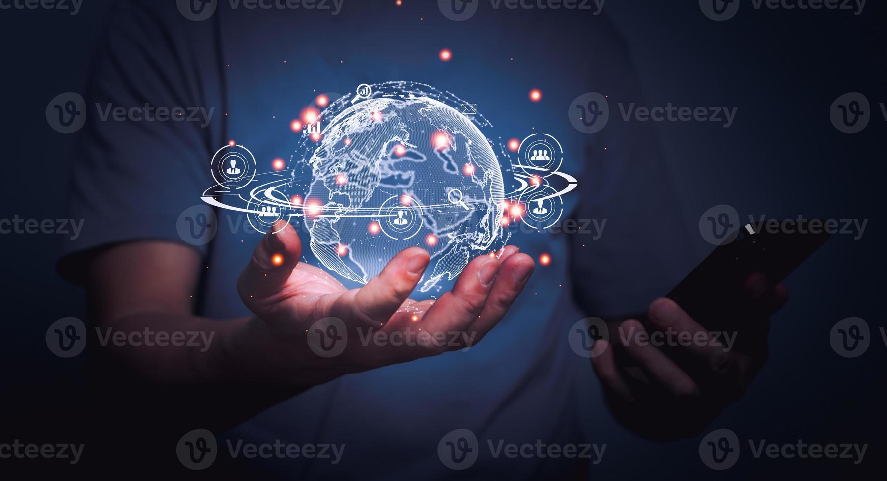 Man using mobile phone and holding globe with Global network communication connection interface, Digital link technology. photo