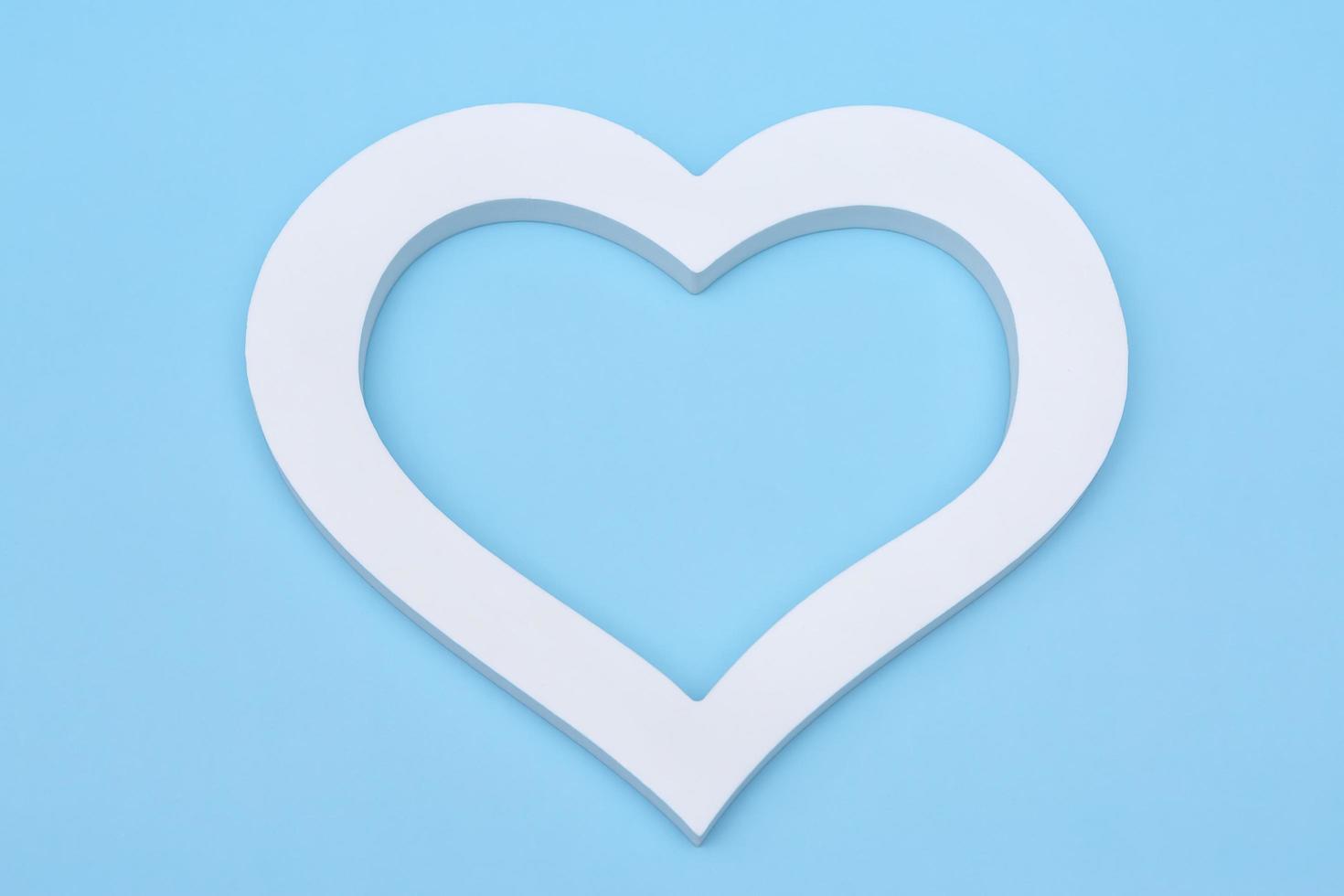 white heart on a blue background photo
