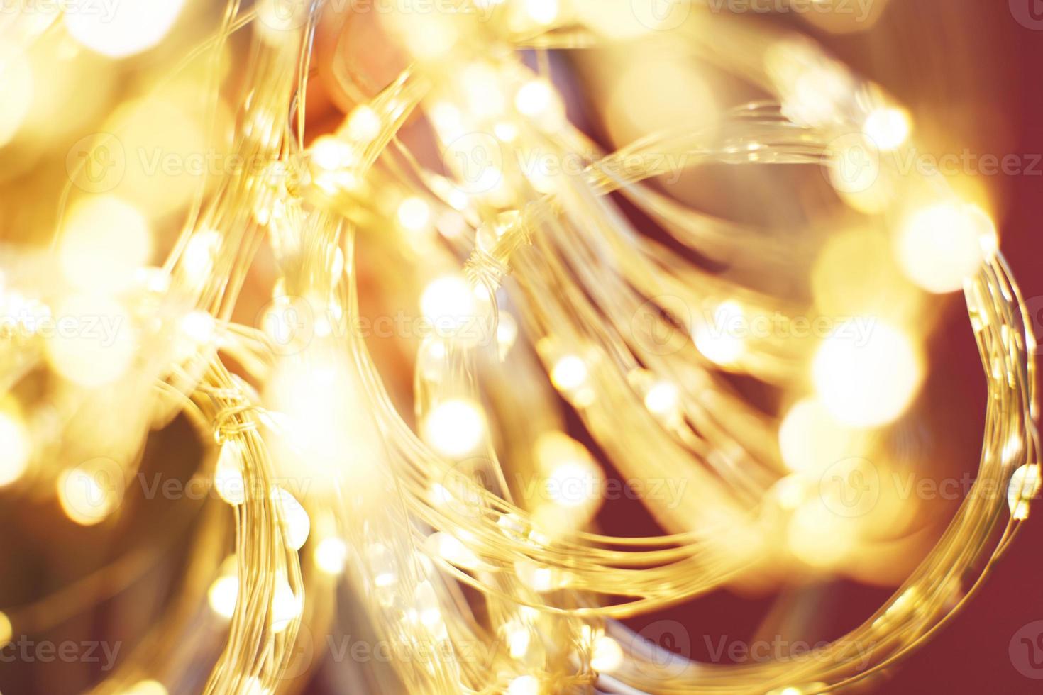 christmas beautifull shiny gold and red background. sparkle festive blurred bokeh photo