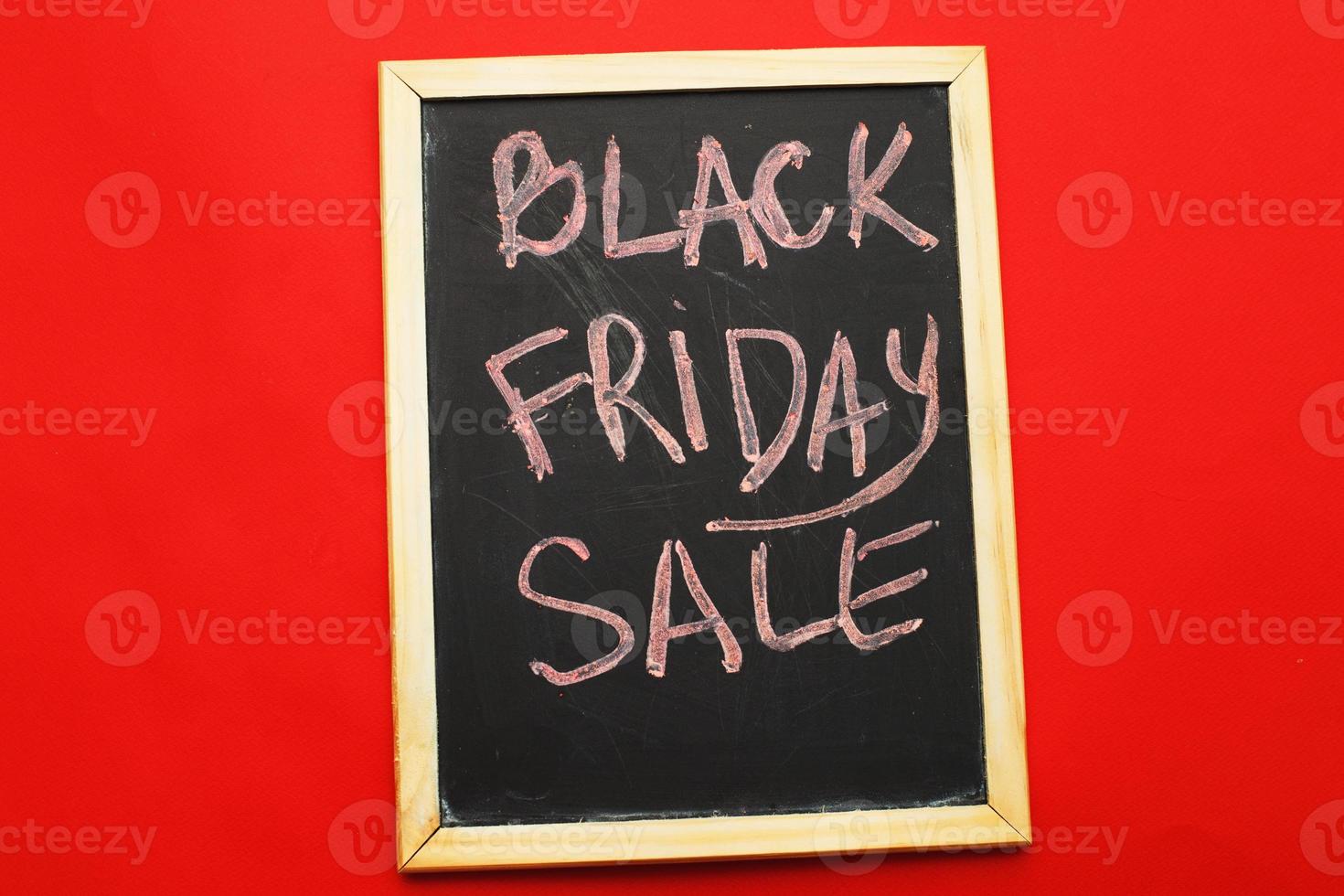 inscription black friday sale on a red background. photo