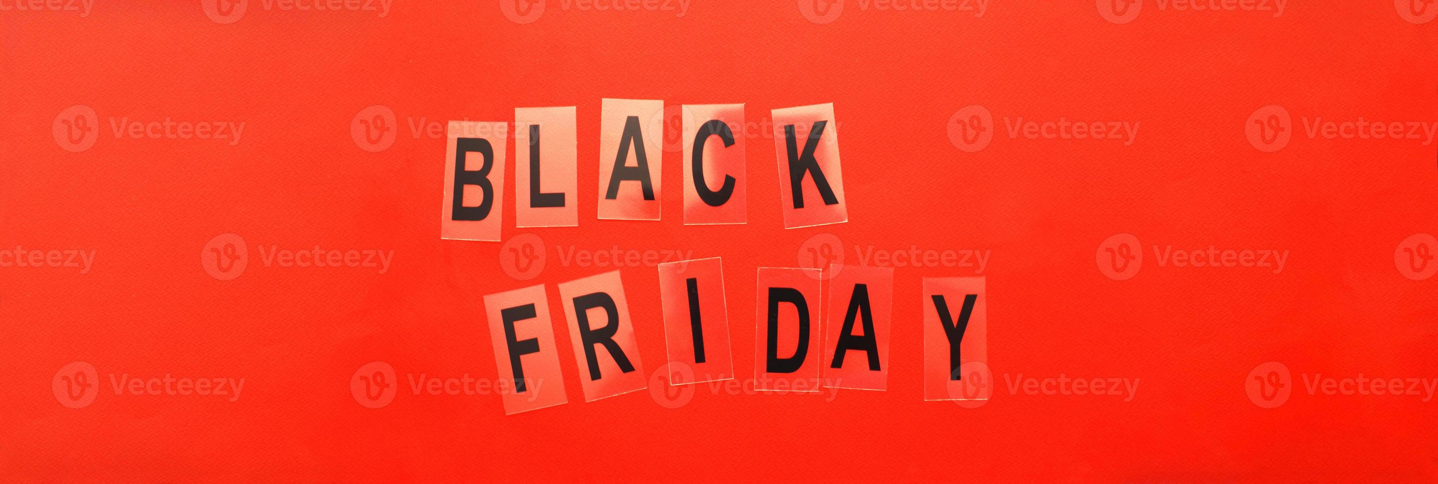 inscription black friday on a red background. banner photo