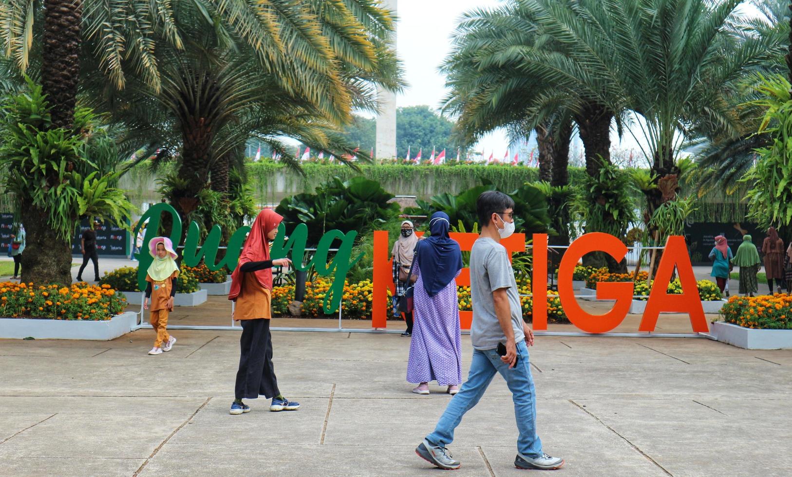 Jakarta, Indonesia in August 2022. Visitors who are lovers of flora and fauna visiting the Flona 2022 exhibition at the Banteng Field in Central Jakarta. photo