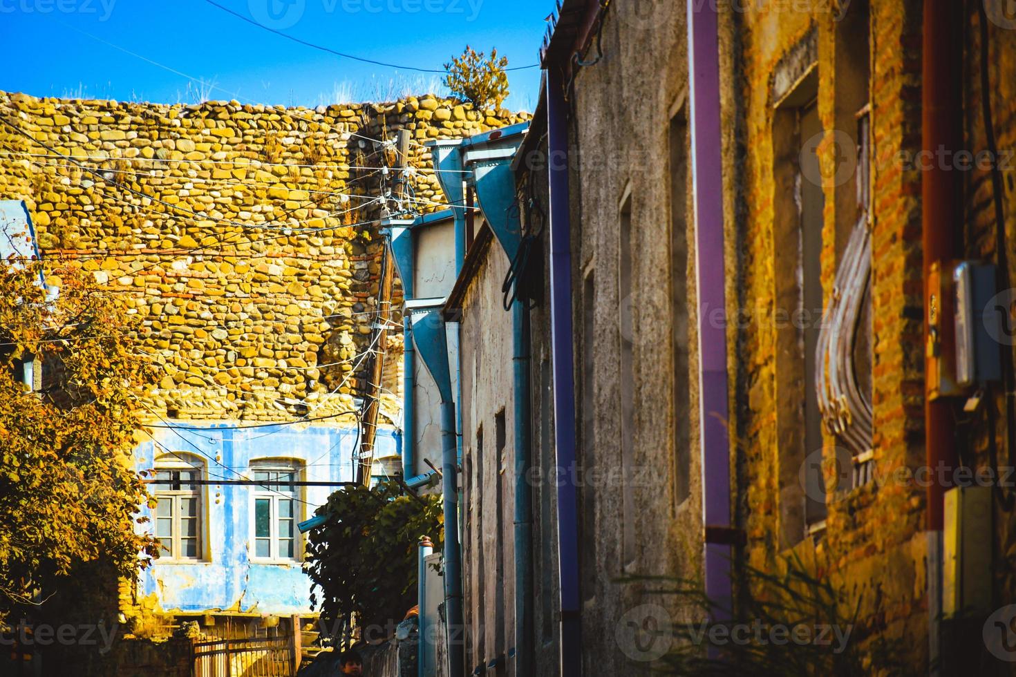 Telavi, Georgia, 2022 - Colorful houses stylish artistic street facades old town in Telavi city center. Historical georgian heritage in Kakheti, wine region photo