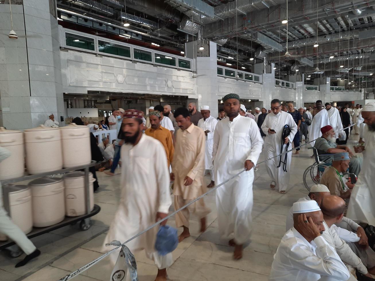 Mecca, Saudi Arabia, Nov 2022 - Pilgrims from around the world wait for Friday prayers on the first floor of Masjid al-Haram in Makkah, Saudi Arabia. photo