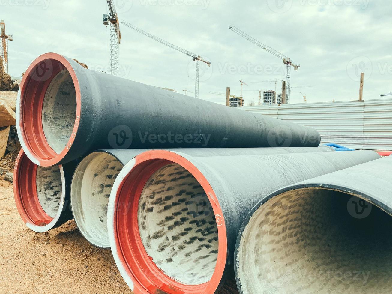 polypropylene pipes made of black material lie on a construction 