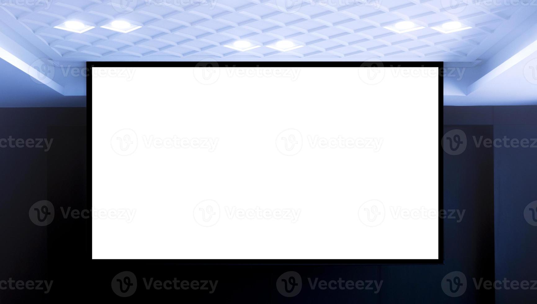 Projector white screen background on stage in meeting room photo