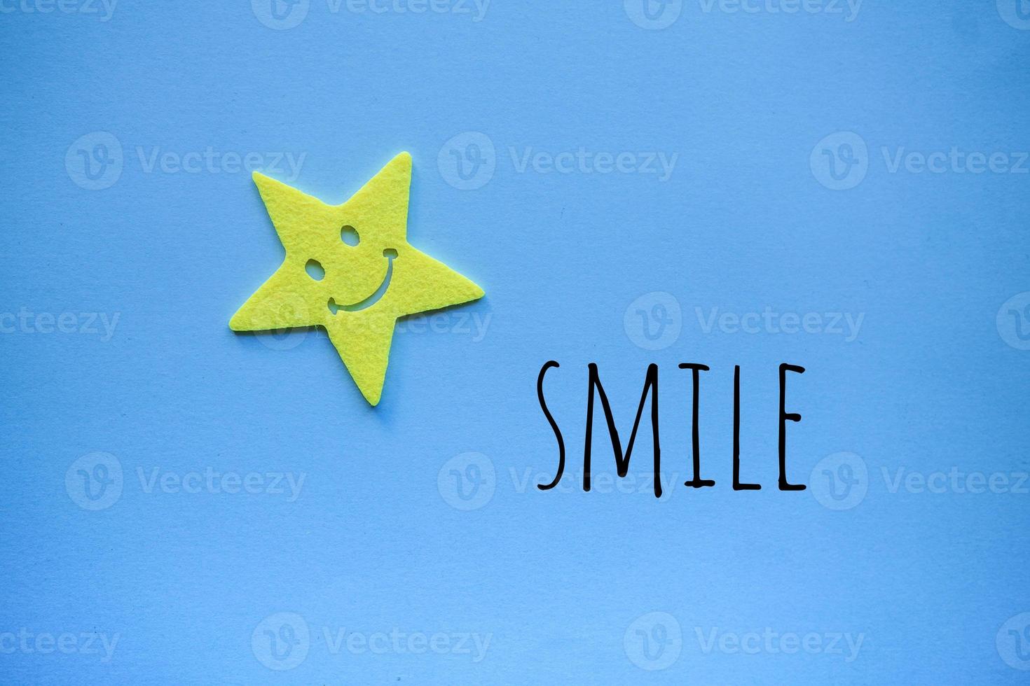 smile emotion on the blue background photo