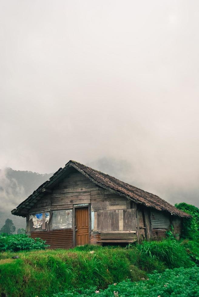 a small hut in the countryside in a mountain in Indonesia photo