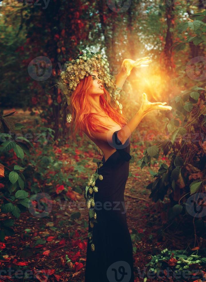 Fantasy photo of young redhair lady wizard