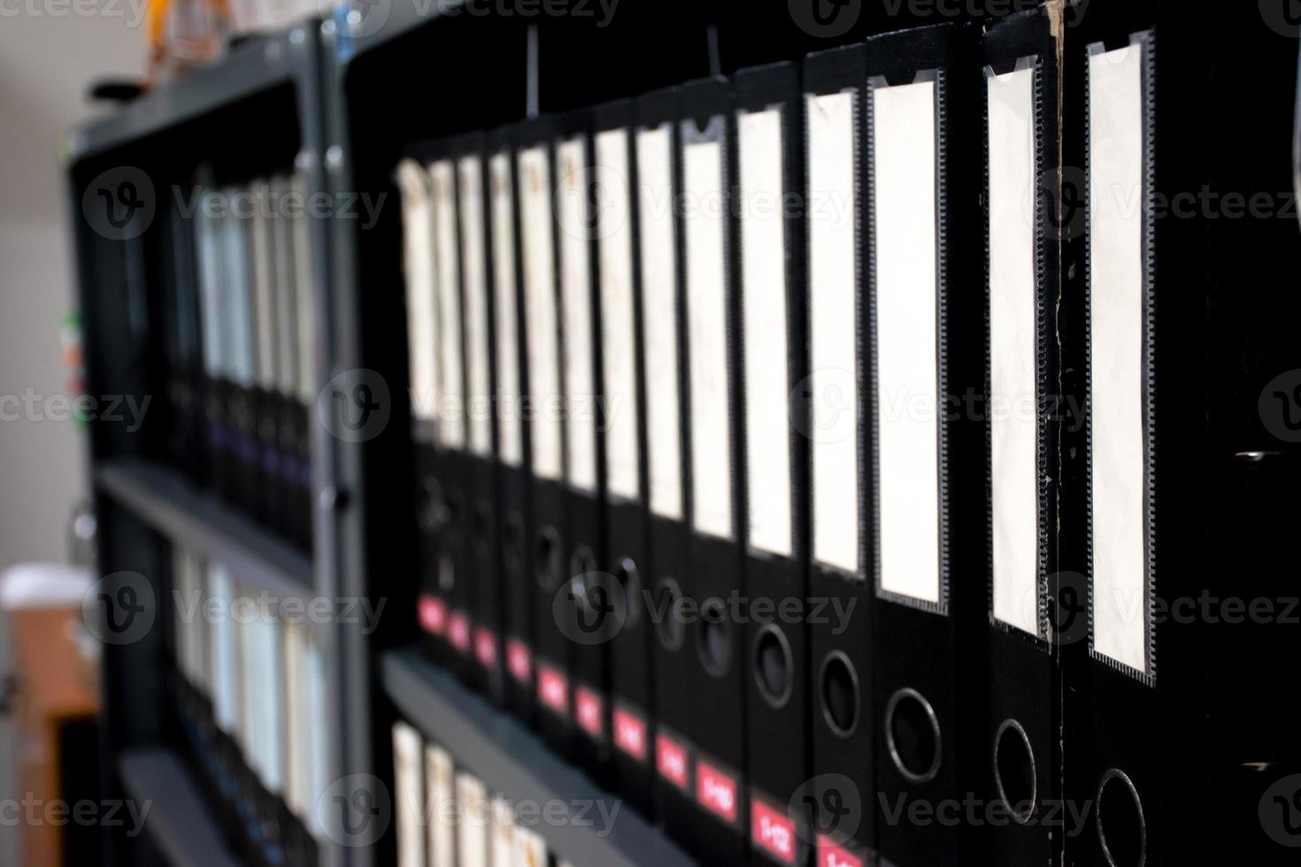 Office document folders standing in a row photo