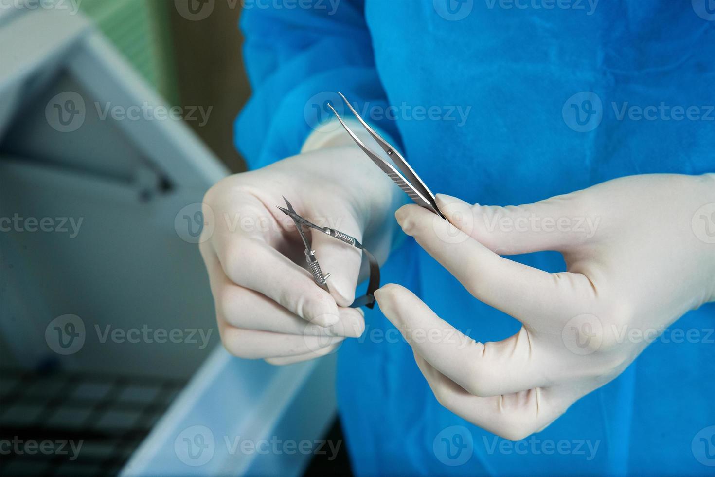macro photo of doctor gets sterile items required for operation