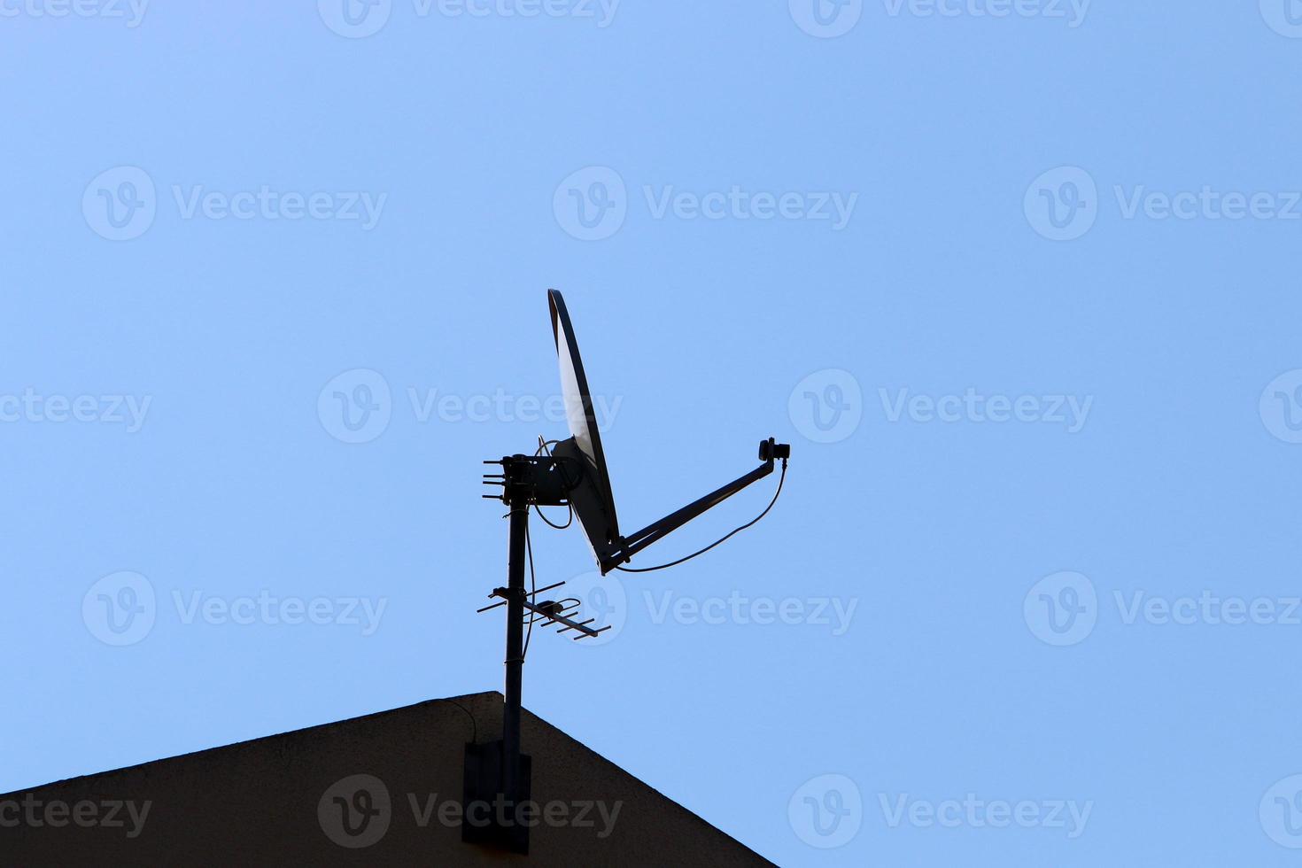 High antenna for emitting and receiving radio waves. photo