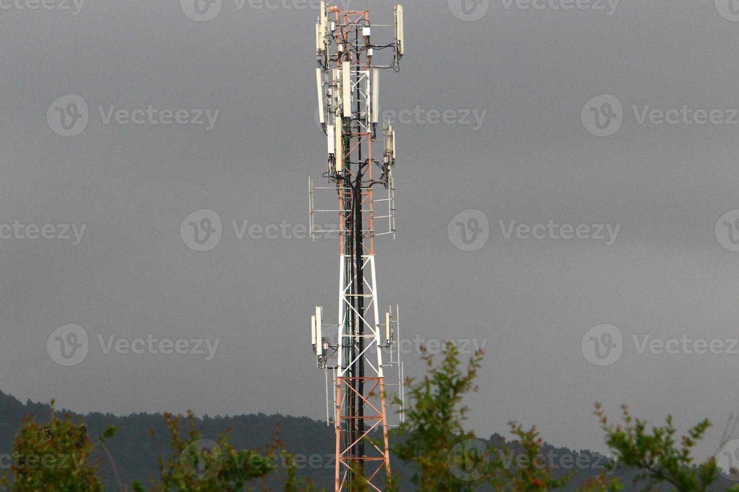 High antenna for emitting and receiving radio waves. photo