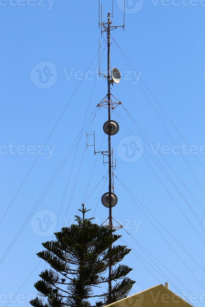 High antenna for emitting and receiving radio waves. photo