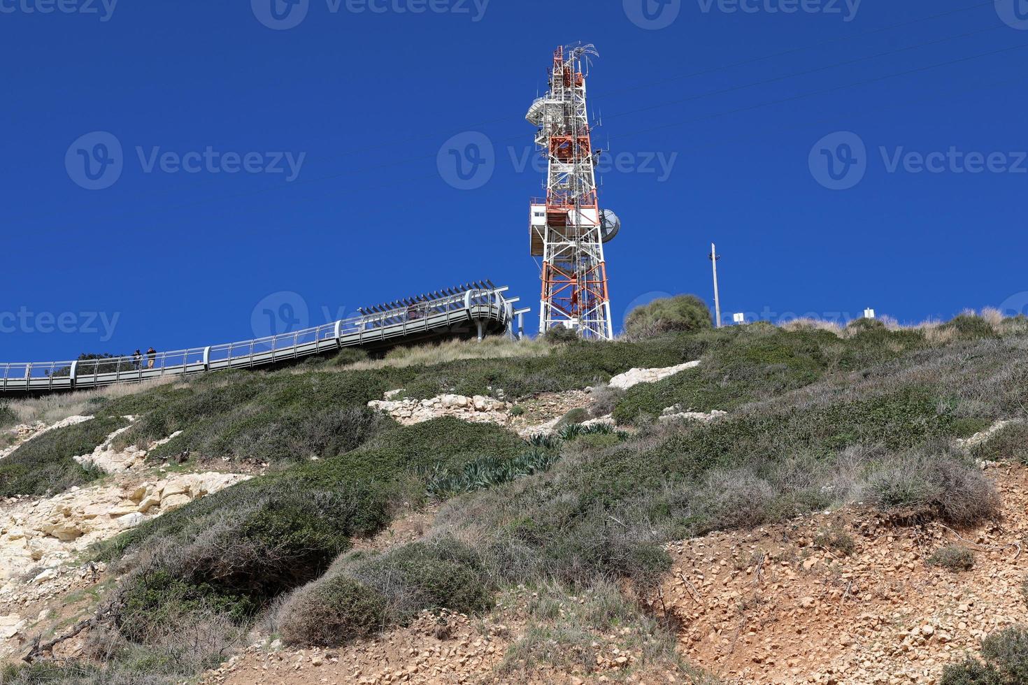High antenna for emitting and receiving radio waves. photo