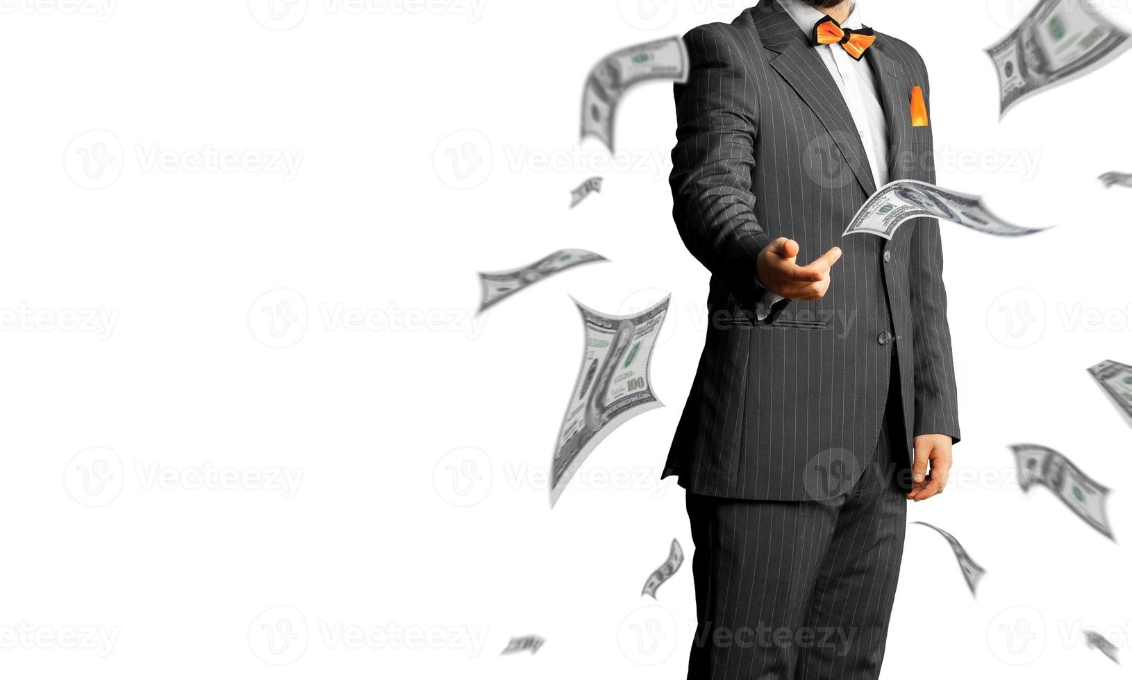 businessman in a suit throws a lot of money isolated on white background photo