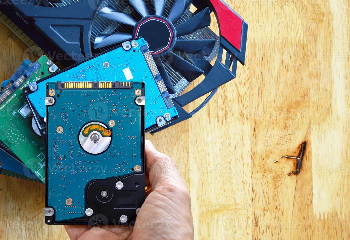 Hard disk drives are still widely used. hard drive in hand 14301933