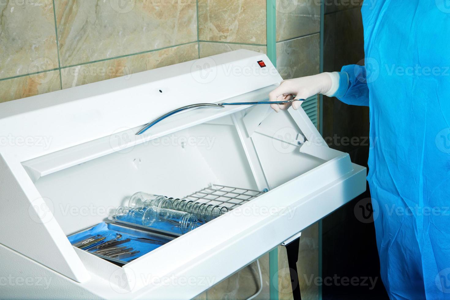 close up photo of doctor gets sterile items required for operation