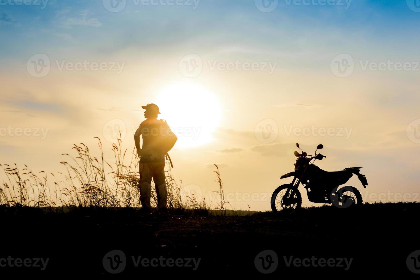 man with motocross beautiful light mountain independent adventure tourism concept photo