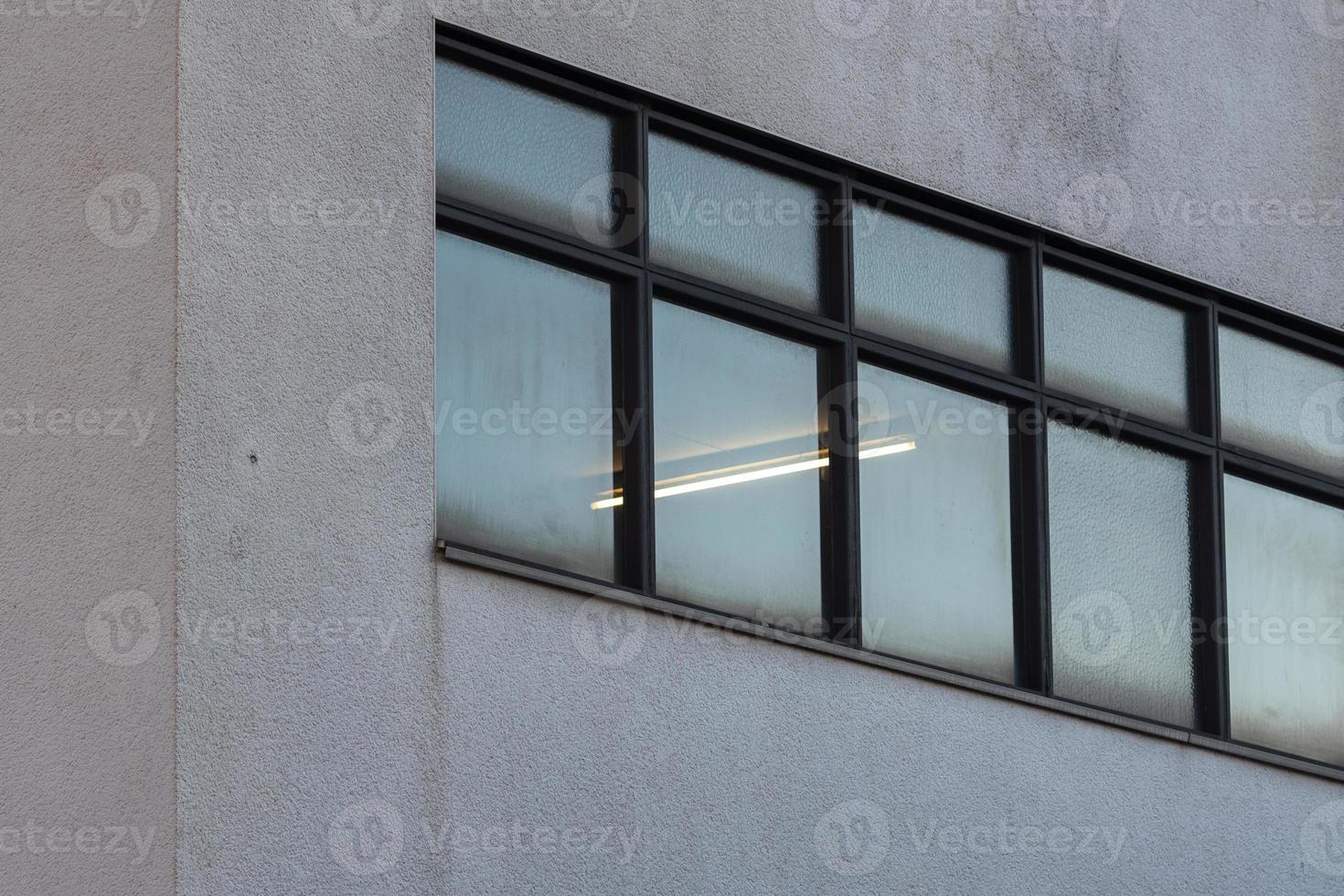 windows of a building in the city photo