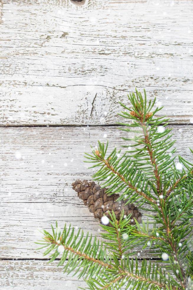 Christmas wooden background with fir tree. Top view copy space photo