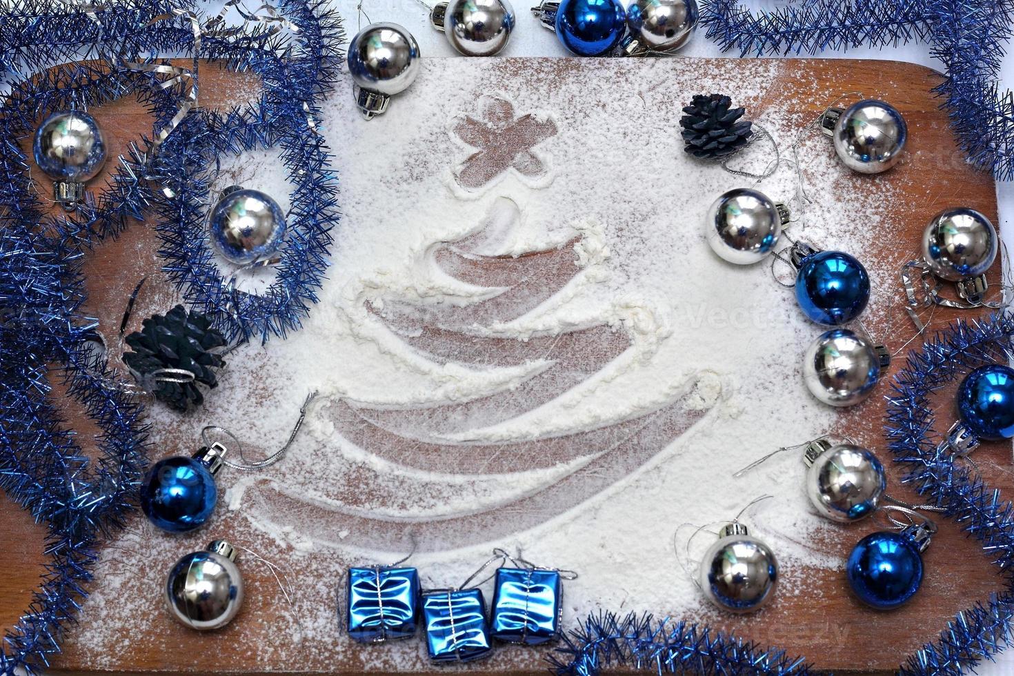 Card with a tree drawn on the flour photo