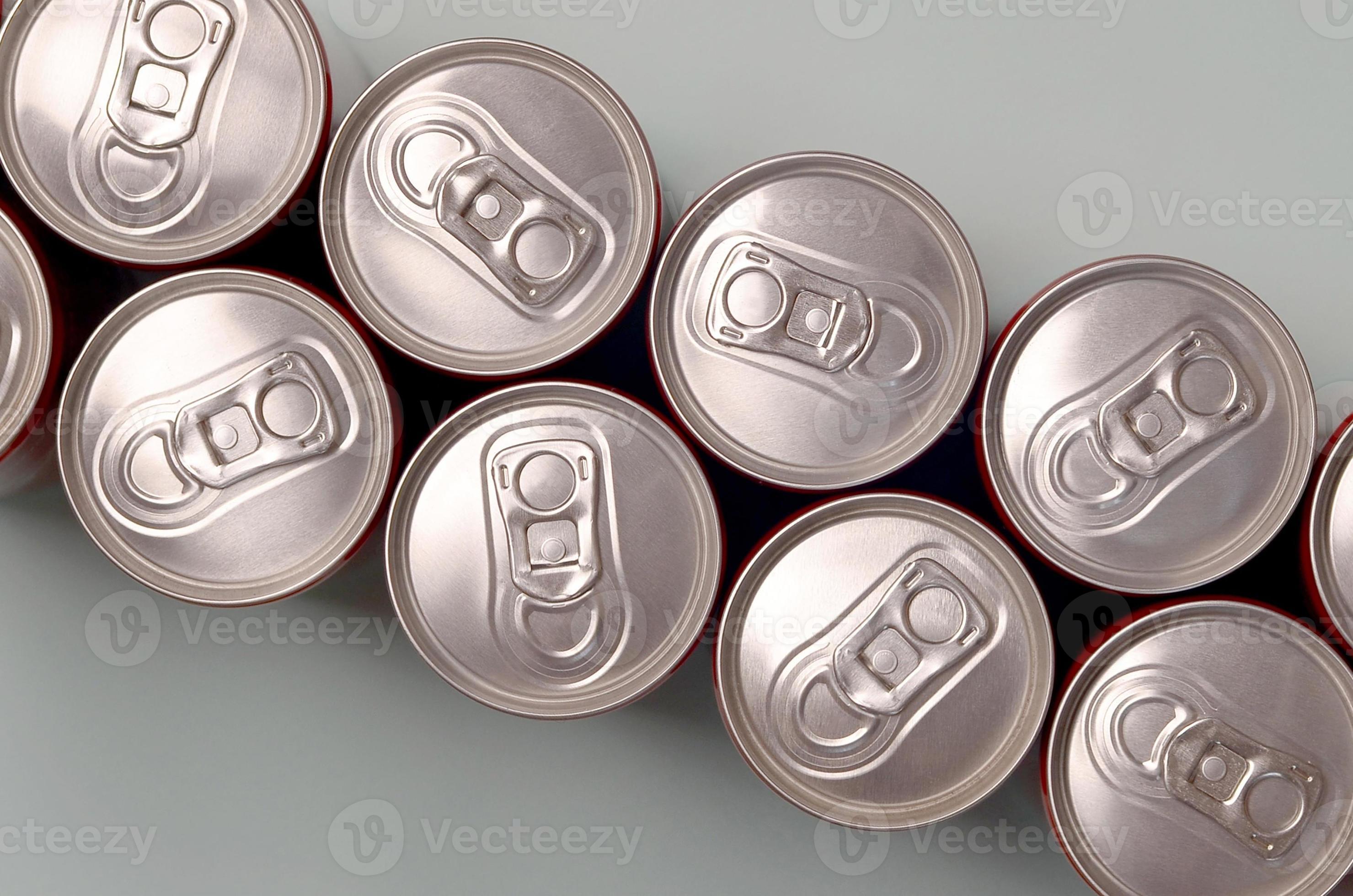 Many new aluminium cans of soda soft drink or energy drink containers