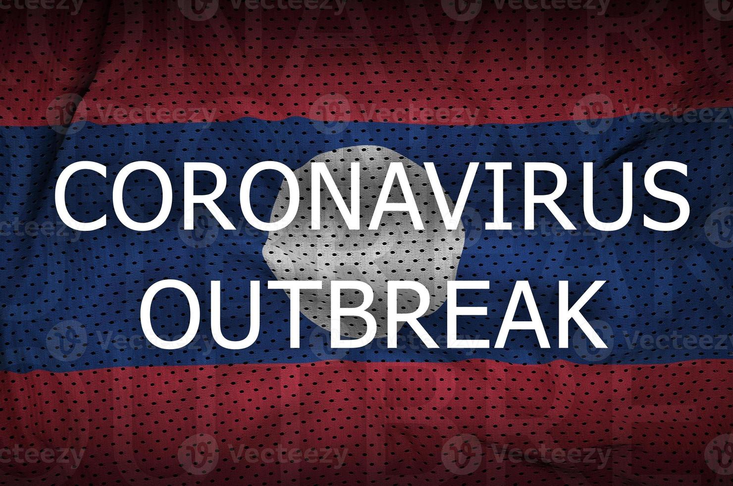 Laos flag and Coronavirus outbreak inscription. Covid-19 or 2019-nCov virus photo