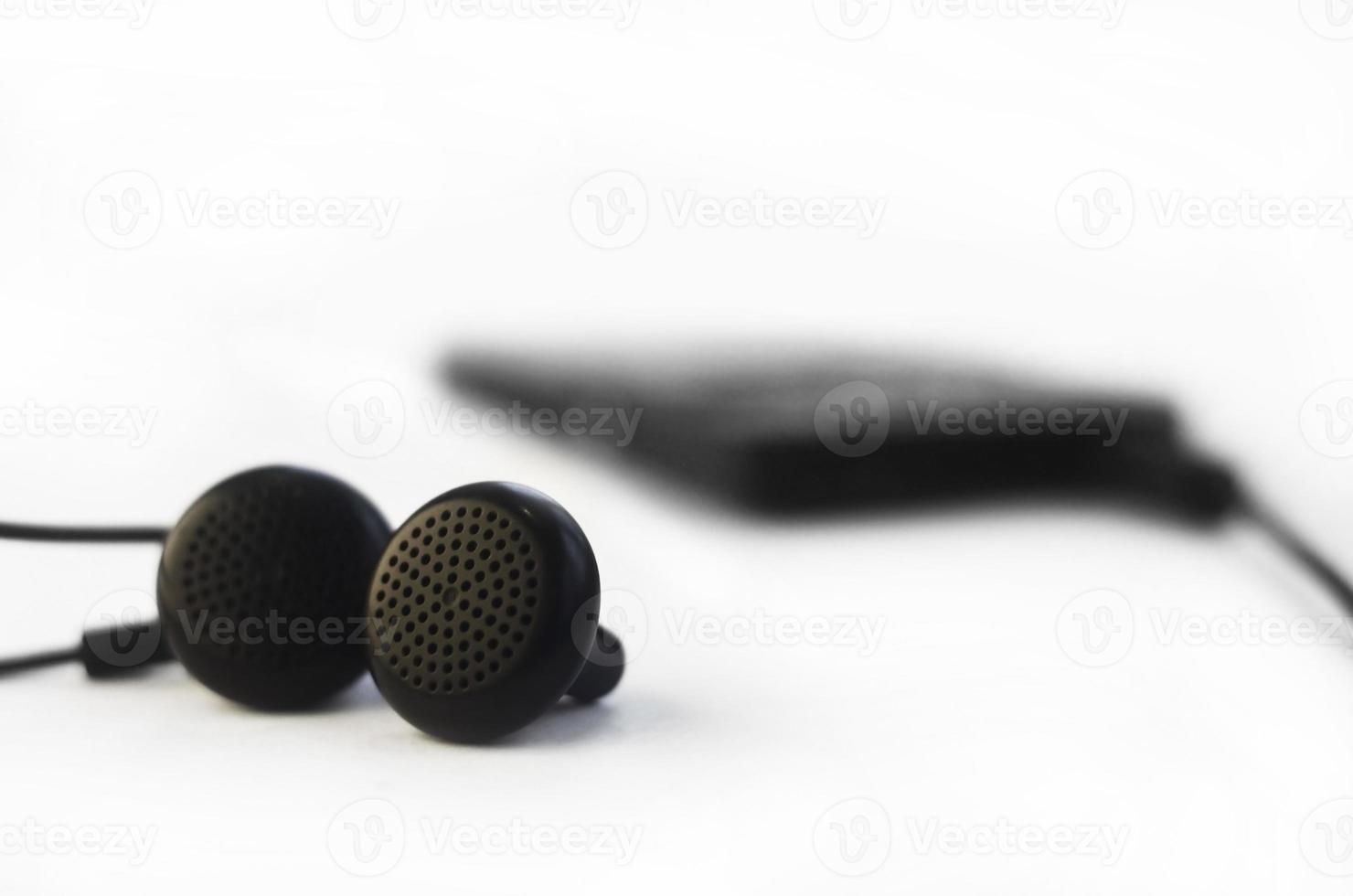 Earphones isolated on white photo