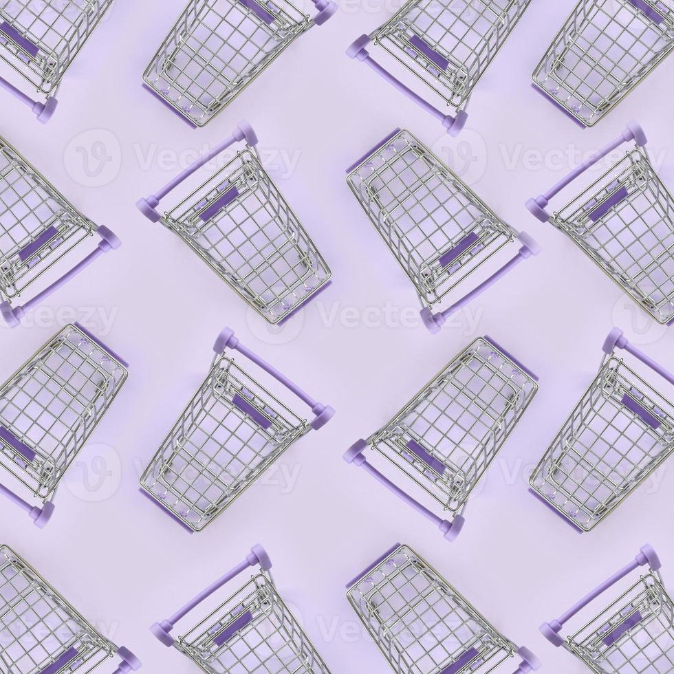 Pattern of many small shopping carts on a violet background. Minimalism flat lay top view photo