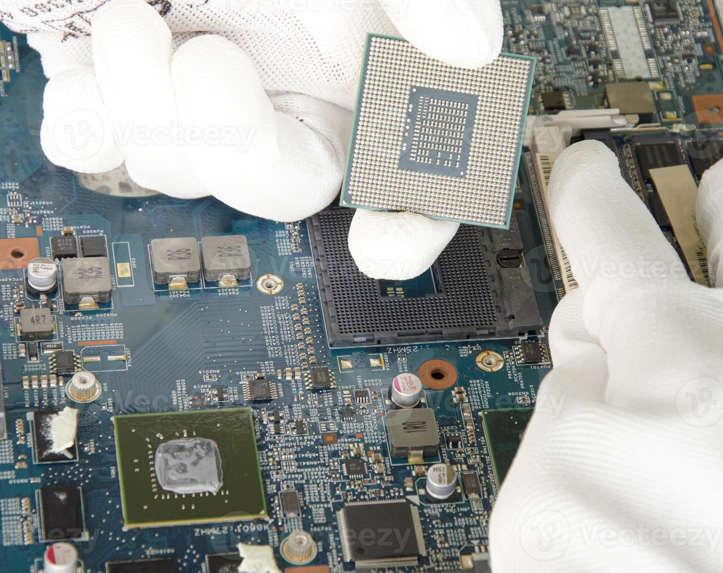 image of a mechanic repairing computer motherboard, electronic