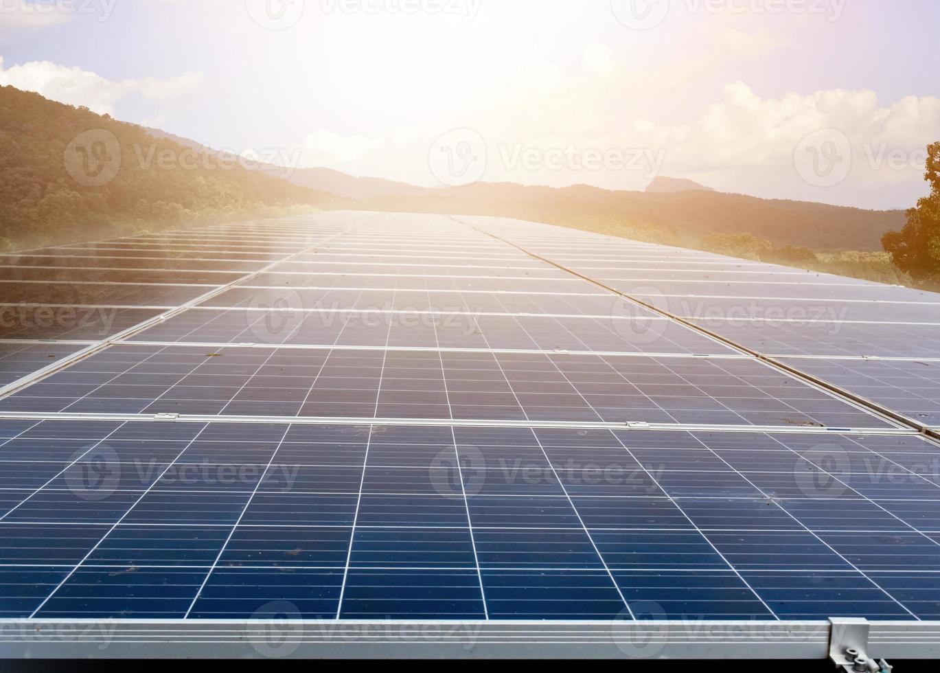 Solar panels, whose upper surface is soiled by rainwater stains, bird droppaings and dust, need to be cleaned to optimize the energy storage of the sun during the day, soft focus. photo