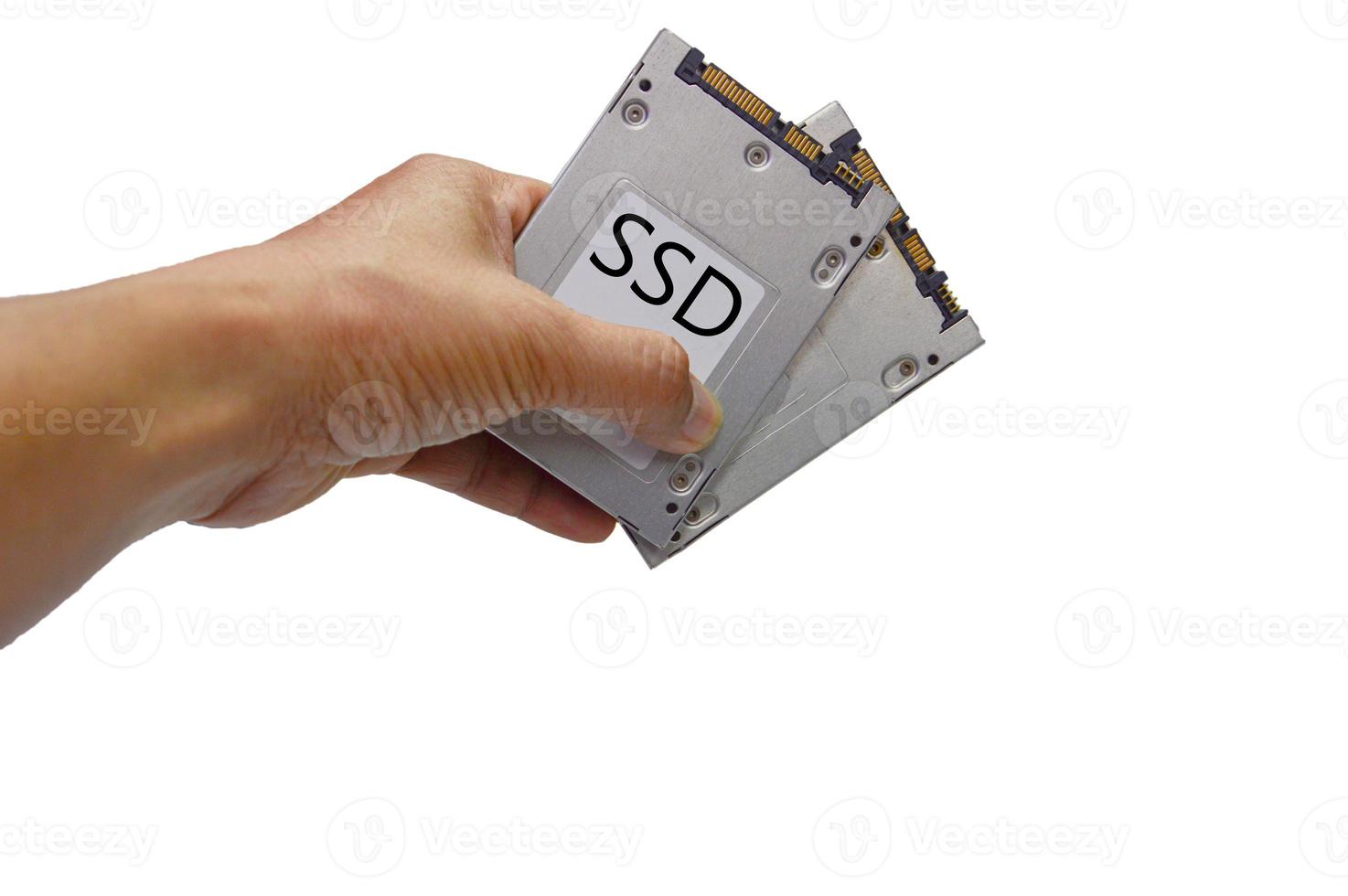 SSD hard drive, hand holding SSD photo