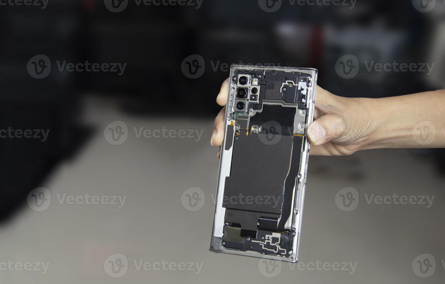 Image of a smartphone removed from the back, smartphone repair photo