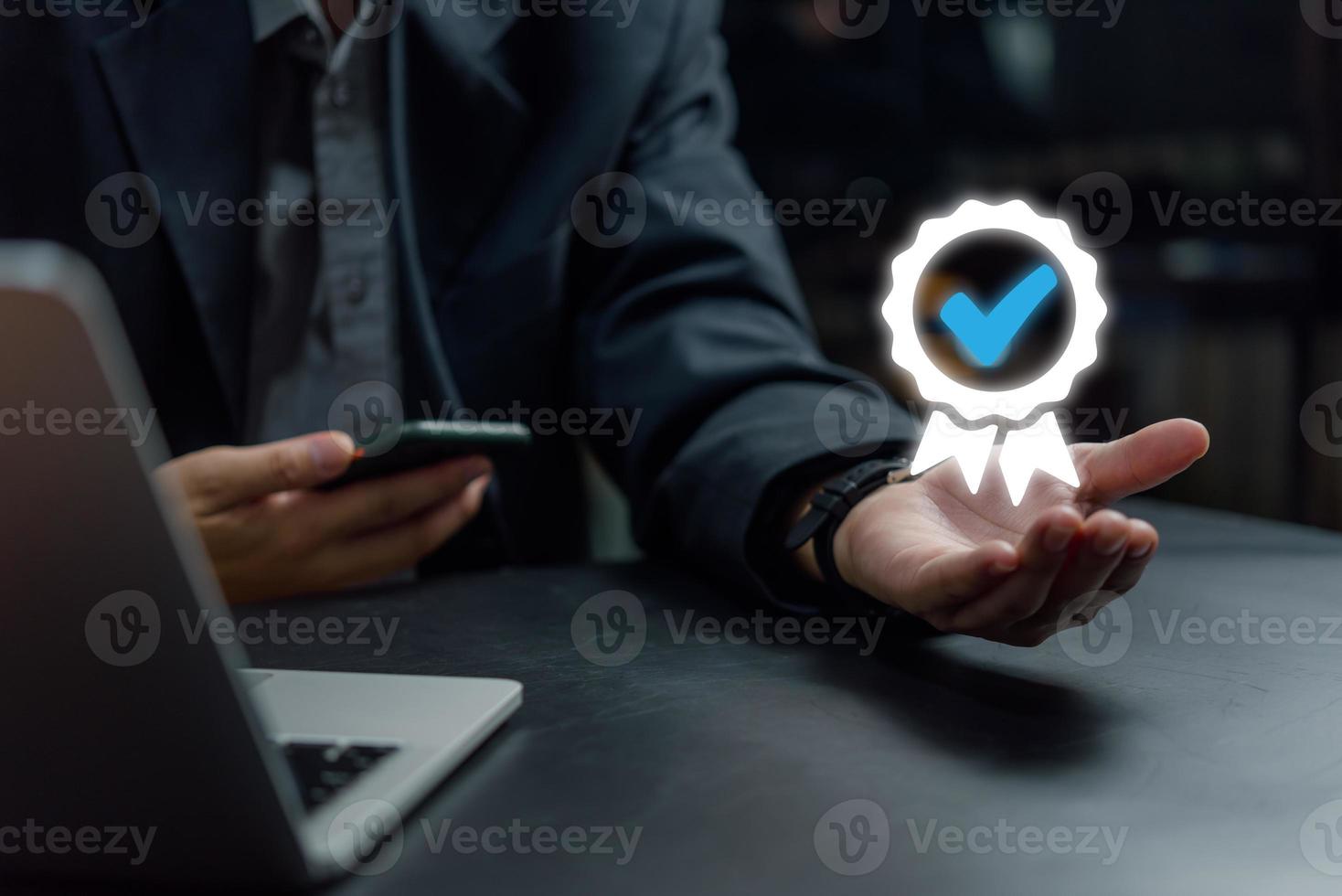 Businessman Hand shows digital technology icon sign of the top service the best Quality assurance, ISO certification and standardization concept. guarantee product and ISO service concept. photo